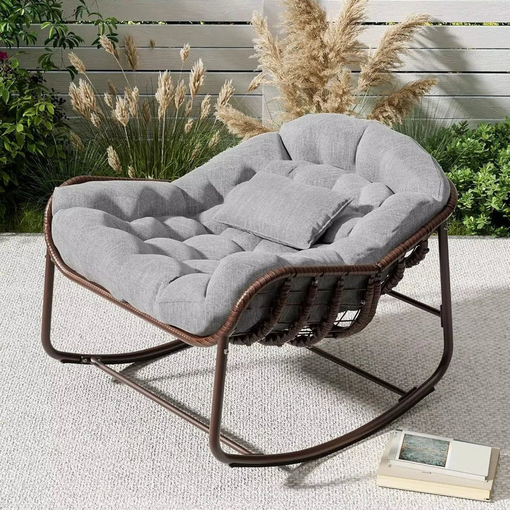 Oversized rattan egg rocking chair – lifestyle setting