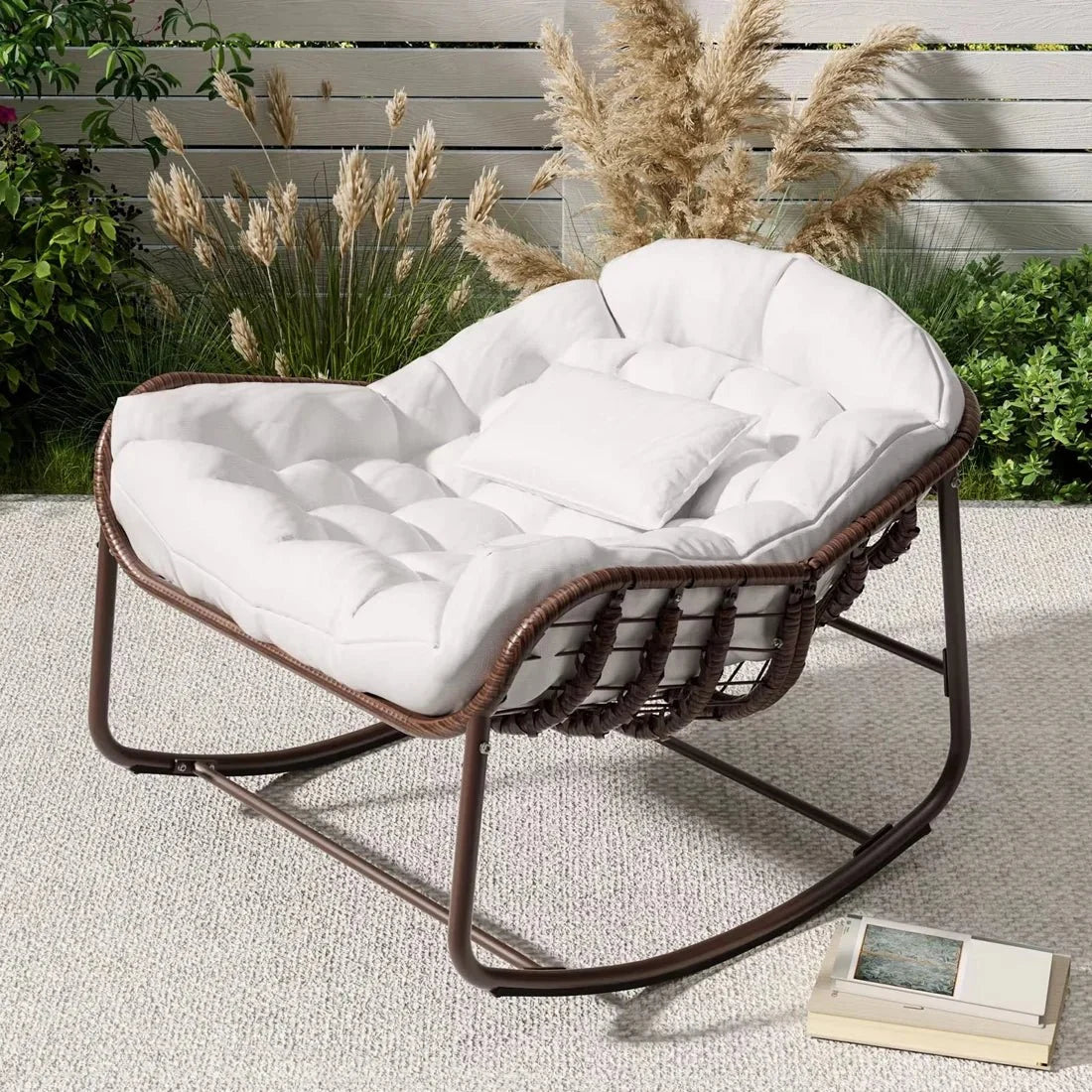 Oversized rattan egg rocking chair – lifestyle setting 2