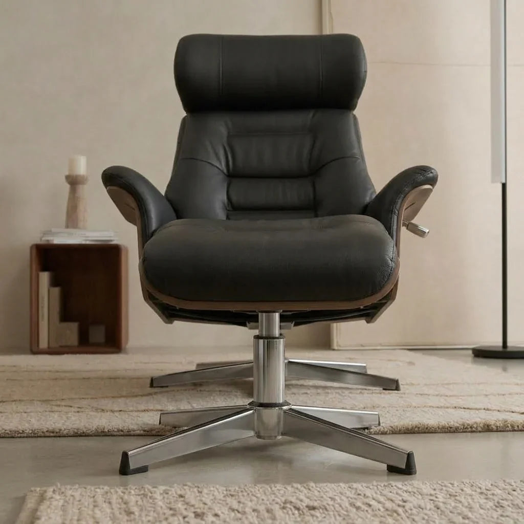 Black faux leather swivel recliner with footstool – front view