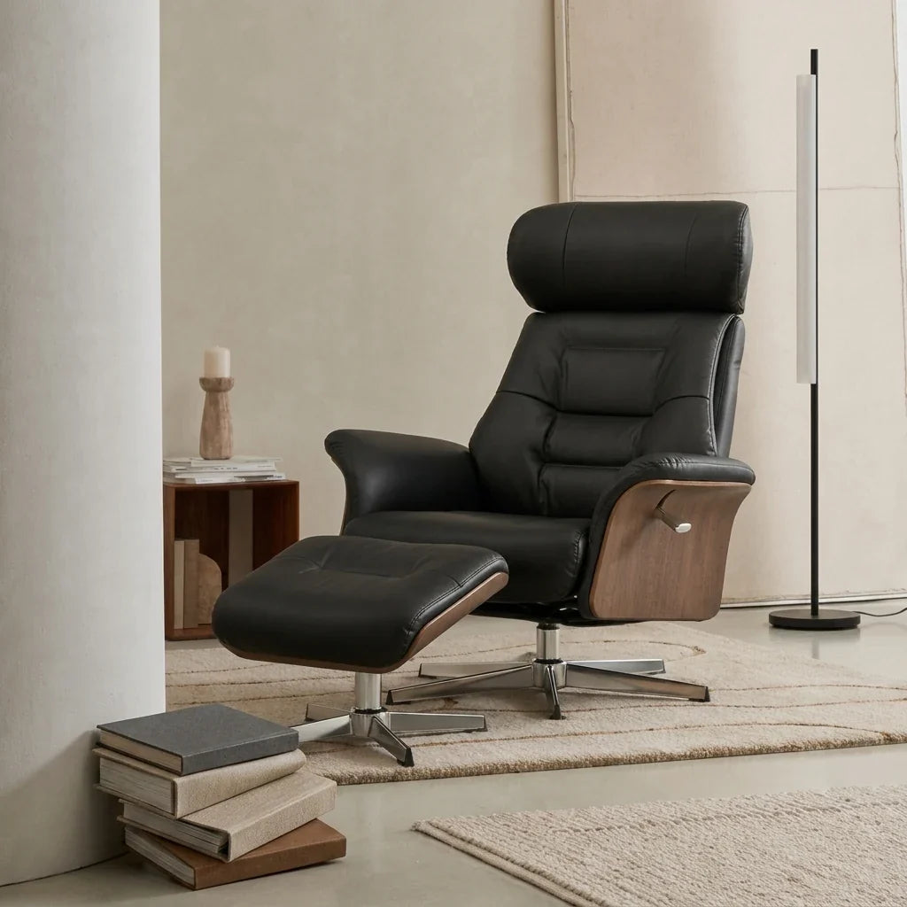 Black faux leather swivel recliner with footstool – product view